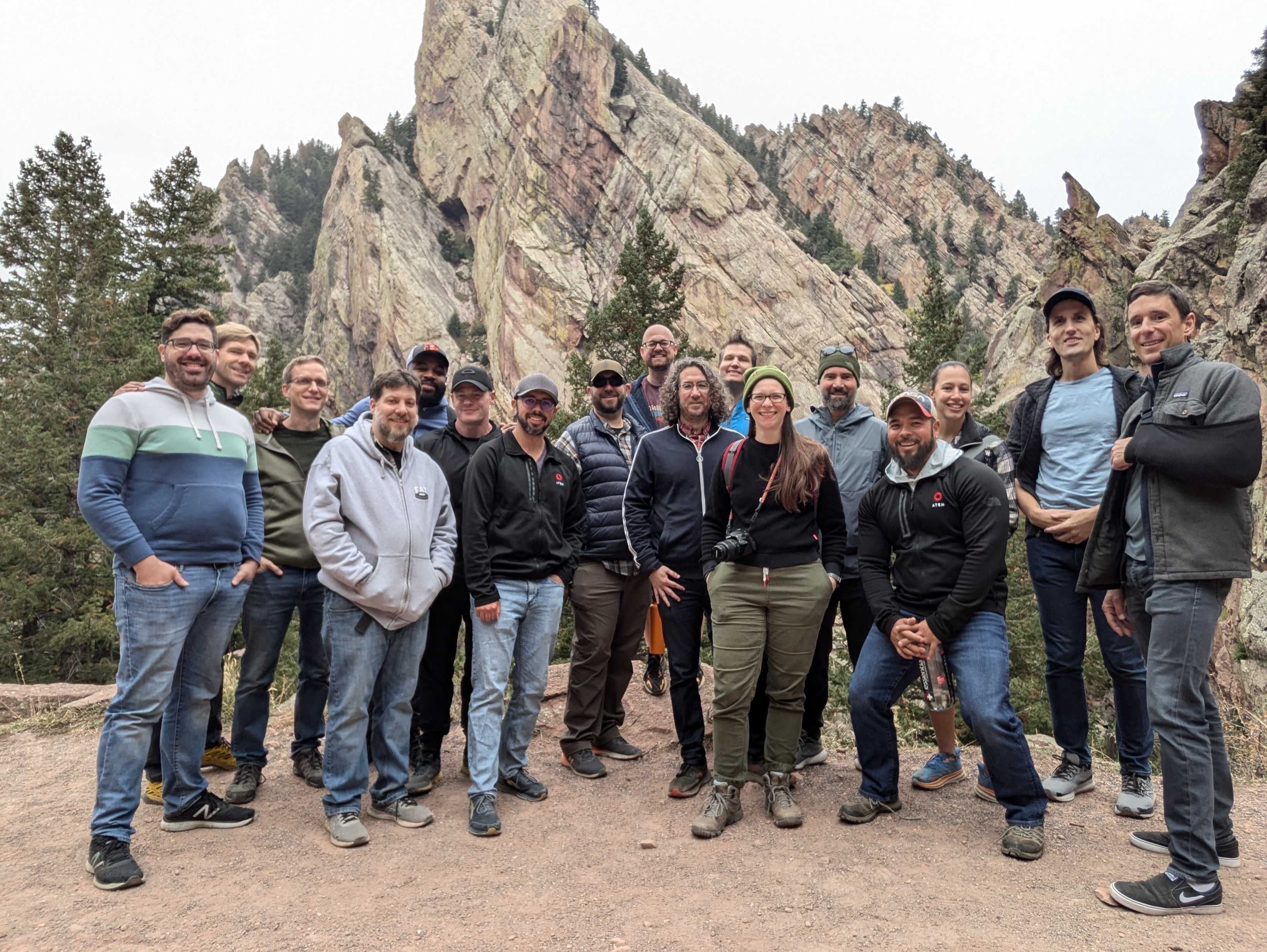 Aten staff standing with mountain behind